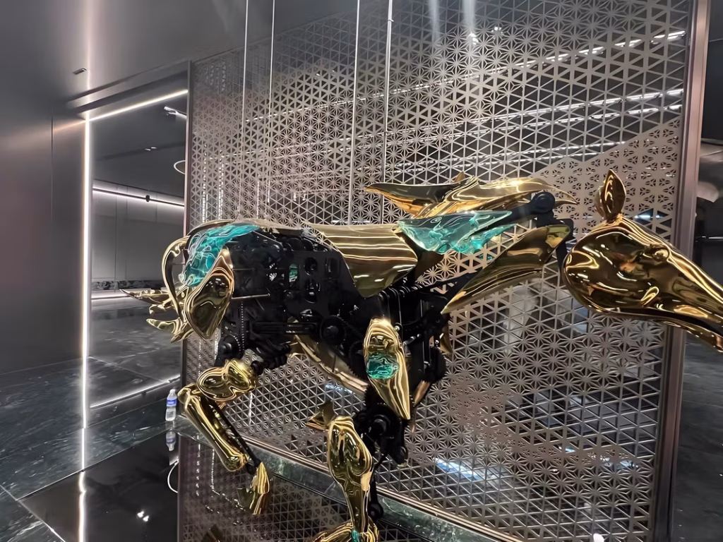 Close-up of golden mechanical horse sculpture, Tangshan Guomaofu Clubhouse by TC Design