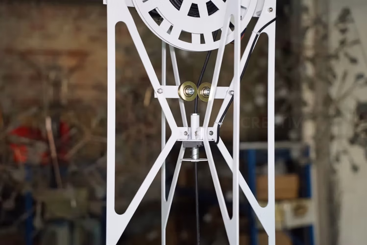 Easy ceiling installation of Lumina Bloom kinetic flower sculpture