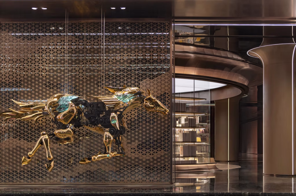 Golden mechanical horse sculpture above library door, Tangshan Guomaofu Clubhouse