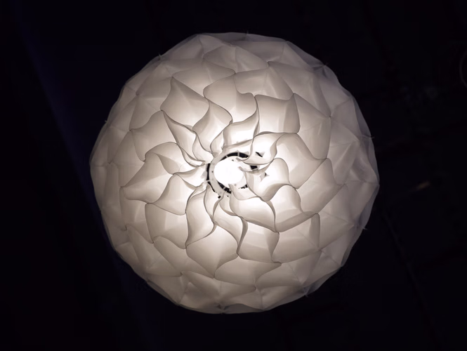 Lumina Bloom kinetic flower sculpture with automatic glowing blooming