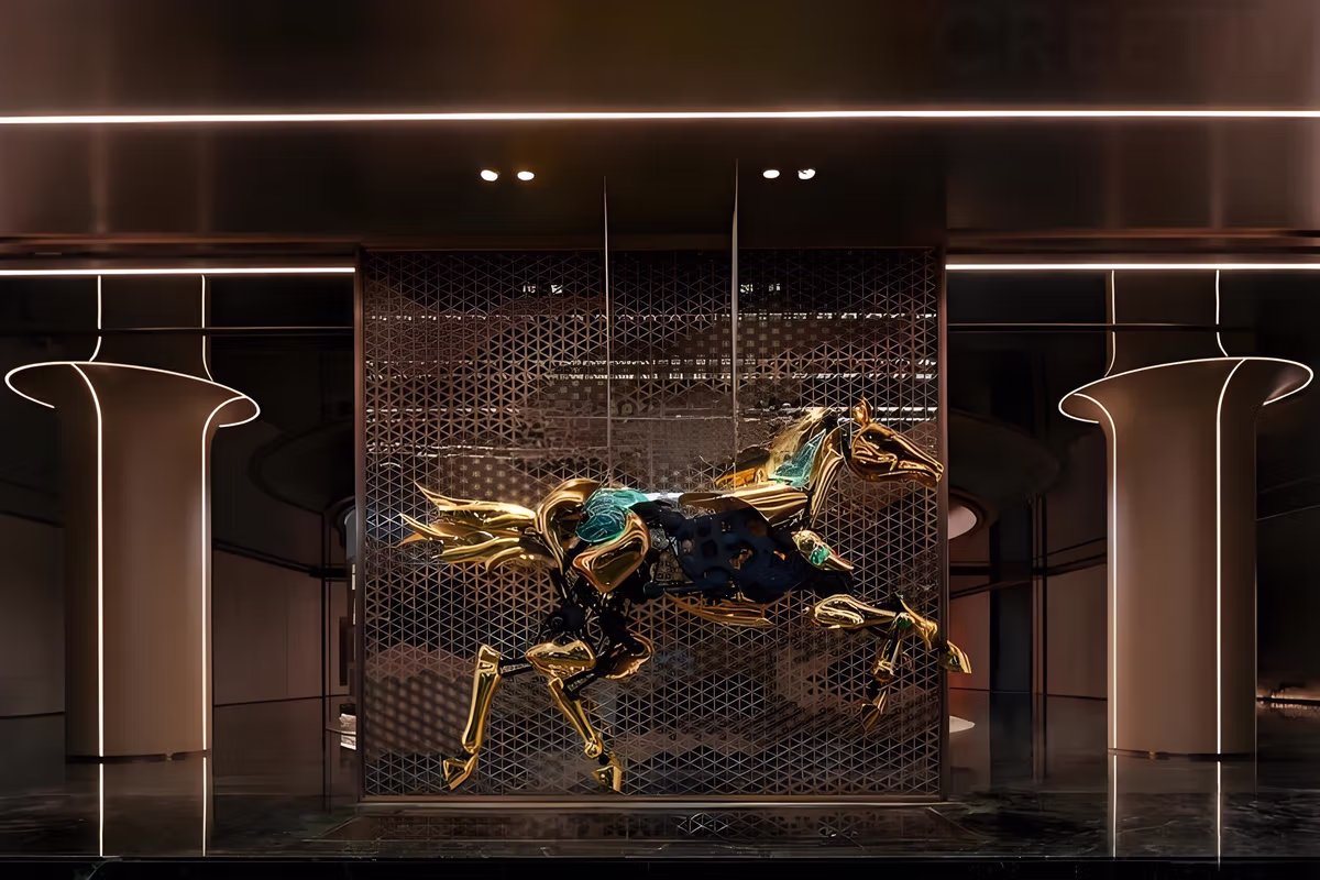 Tangshan Guomaofu Clubhouse lobby with suspended 3.5m golden mechanical horse sculpture